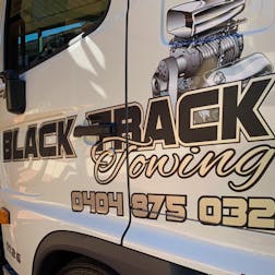 Logo of Black Track Towing